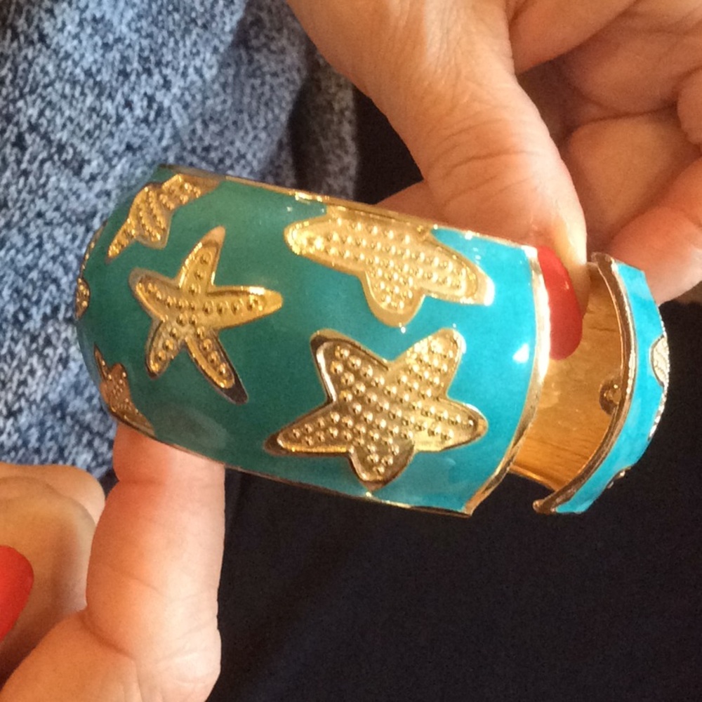 Aqua enamel bangle with gold starfish. Brand new